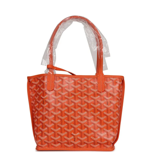 fake designer bags Goyard Goyardine Mini Anjou Reversible Tote Bag in Orange with Palladium HardwareYellow with Palladium Hardware front